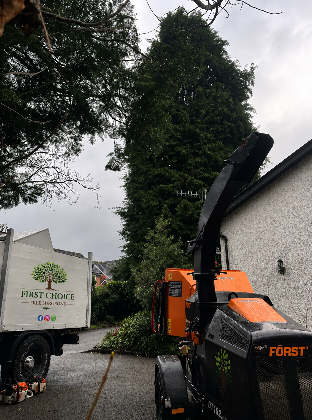 First Choice Tree Surgeons chipper and truck on site